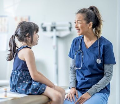pediatrician with patient